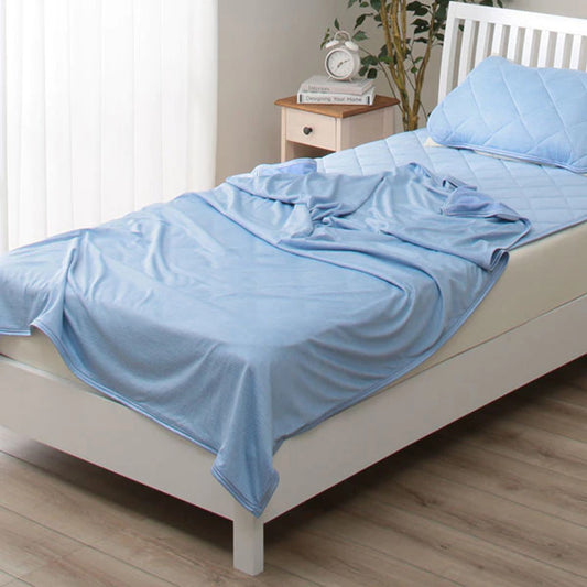 Cooling fiber blanket by Next Gen Health and Wellbeing, washable cover designed to absorb heat and keep cool during summer.